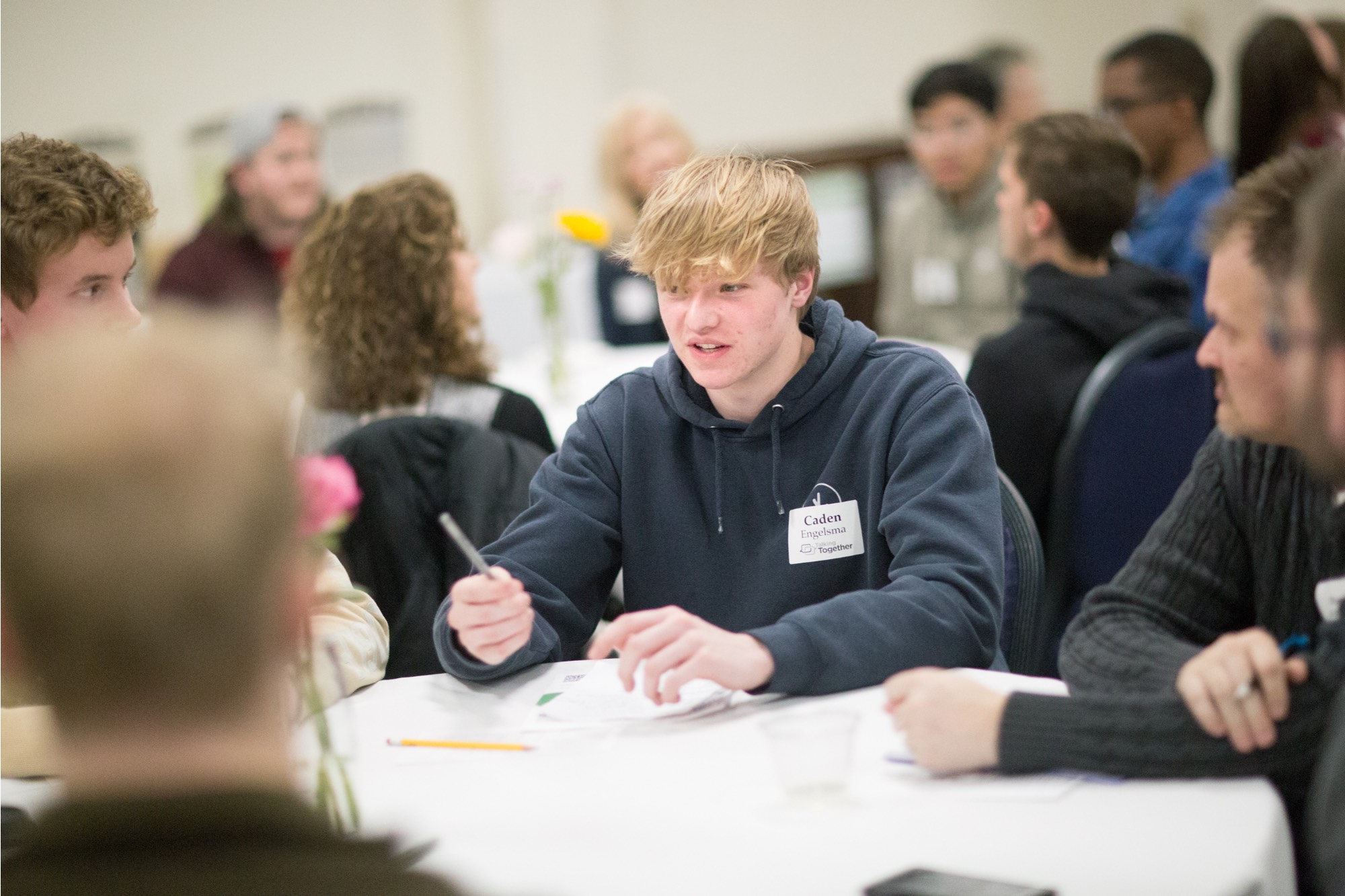 people talking at table